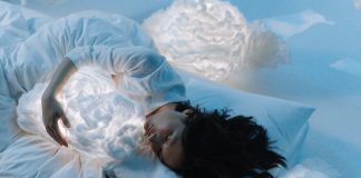 How to Know what Kind of Pillow You Need woman-sleeping-hugging-a-cloud