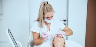 How Celluma light therapy is effective for everyone? person making cosmetological operation