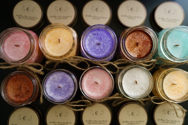 assorted soy candles of different colors