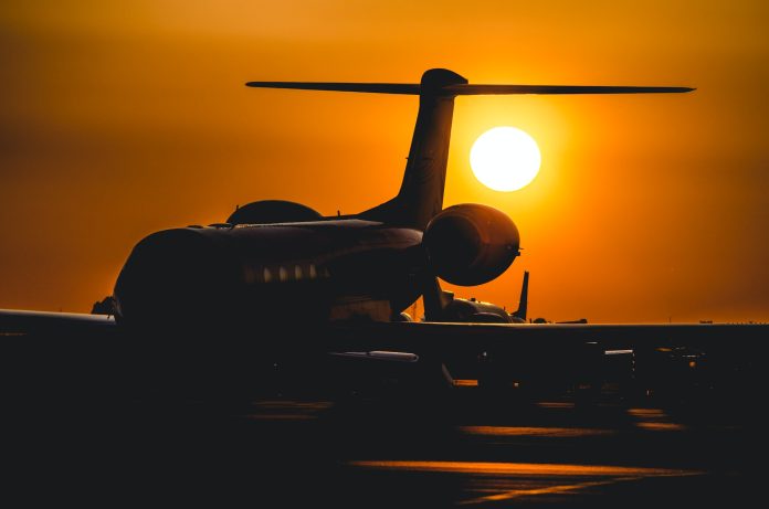silhouette of private jet