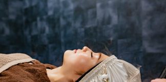 Why I Switched to a Silk Hair Wrap (and Never Looked Back) a-woman-getting-her-hair-brushed