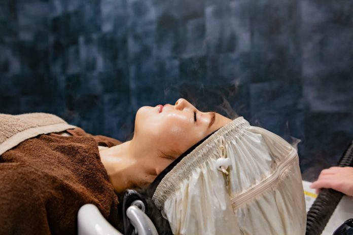 a-woman-getting-her-hair-brushed
